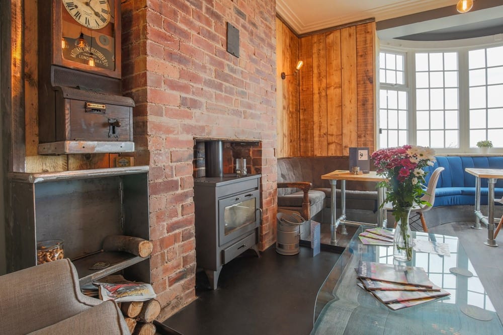 The cosy log-burning stove inside Grazing Harts